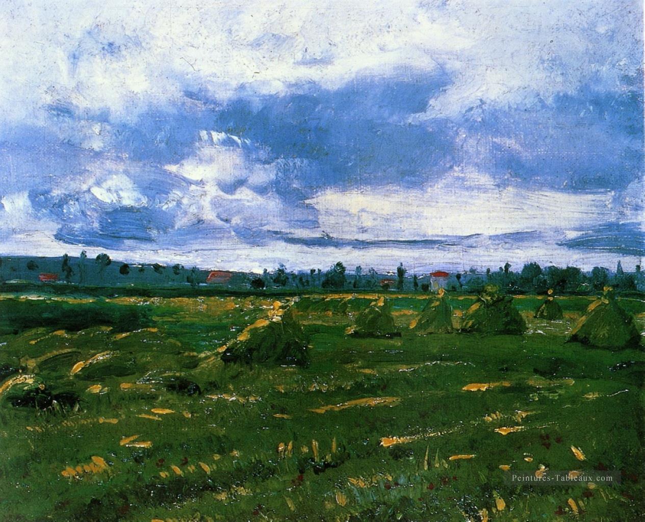 Champs de blé avec des piles Vincent van Gogh Peintures à l'huile